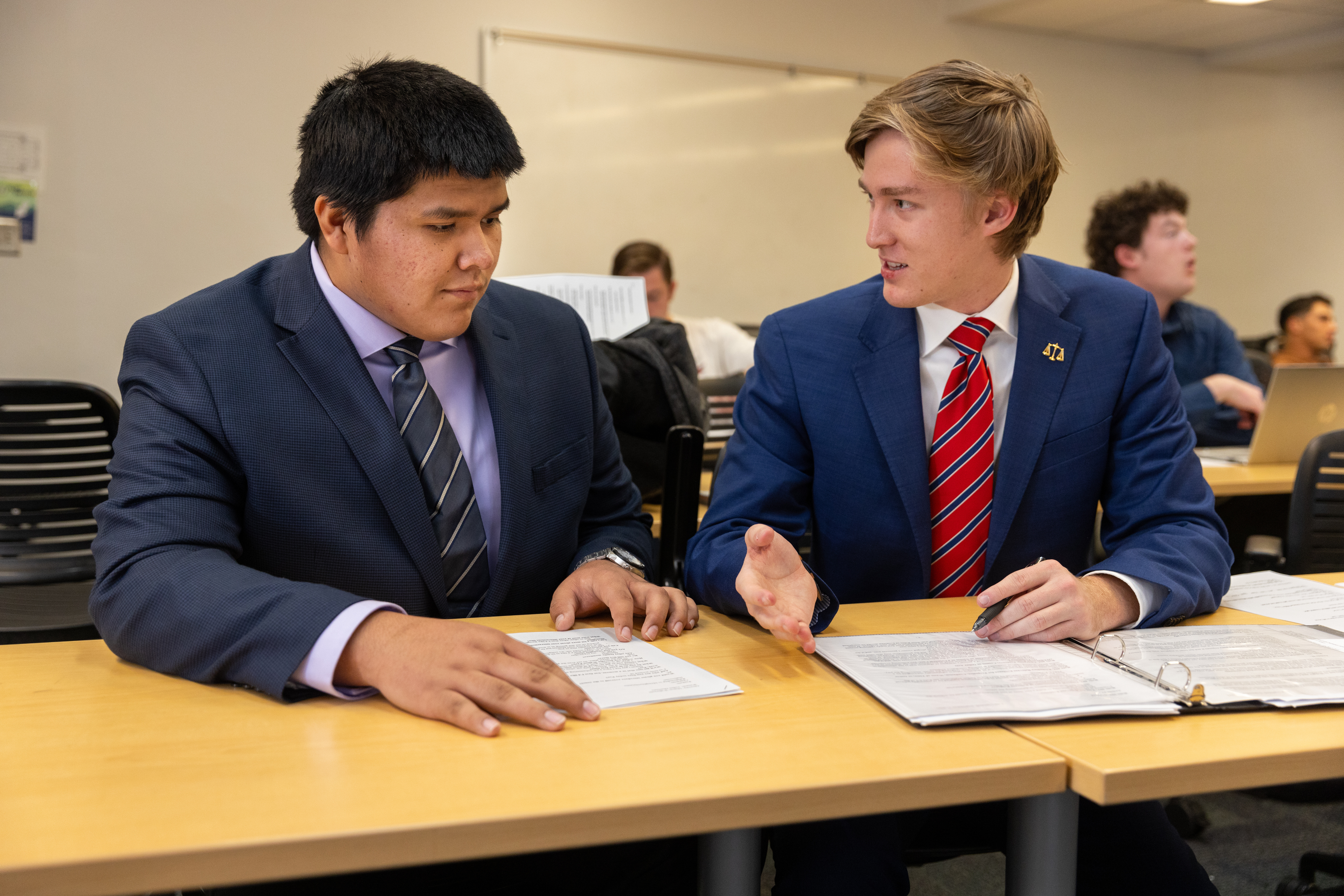 Two NAU students prepare for a mock trial during a Politics and International Affairs project.