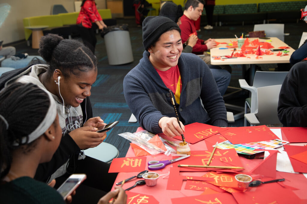 Students celebrating the Chinese new year at a club event